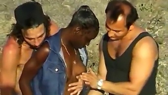 Two White Guys Pleasure A Black Woman By The Seaside In Amateur Threesome