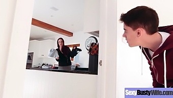 Big-Titted Housewife Emma Butt Engages In Intense Sexual Activity In This Explicit Video