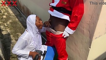 A Joyful Christmas Scene Featuring A Sexy Hijab-Wearing Woman And Santa Engaging In Intimate Acts. Support Us By Subscribing